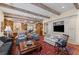 Spacious living room with built-ins and an open floor plan at 585 Old Cobblestone Dr, Atlanta, GA 30350