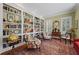 Cozy living room with built-in bookshelves, plush seating, and natural light creates a relaxing atmosphere at 585 Old Cobblestone Dr, Atlanta, GA 30350