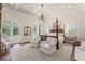 Spacious main bedroom with sitting area, coffered ceiling, and access to a private balcony at 585 Old Cobblestone Dr, Atlanta, GA 30350