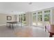 Recreation room with a ping pong table and natural light, perfect for Gathering fun and games at 585 Old Cobblestone Dr, Atlanta, GA 30350