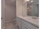 The bathroom features double sinks, a large mirror, and a walk-in shower at 16 Deer Place, Villa Rica, GA 30180