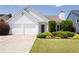 Charming one-story home with a well-manicured lawn and a two-car garage at 4527 Baker Grove Nw Rd, Acworth, GA 30101