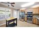 Modern kitchen equipped with stainless steel appliances and ample counter space at 4527 Baker Grove Nw Rd, Acworth, GA 30101