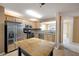 Bright kitchen featuring stainless steel appliances, ample counter space, and a butcher block island at 4527 Baker Grove Nw Rd, Acworth, GA 30101