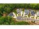 Aerial view featuring beautiful luxury homes, complemented by lush green landscaping at 126 Owens Mill Pl, Canton, GA 30115
