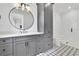 Beautiful bathroom with modern vanity, stunning tile flooring, and a glass walk-in shower at 126 Owens Mill Pl, Canton, GA 30115