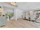 Stylish dining area with neutral toned walls, seating for eight and decorative chandelier at 126 Owens Mill Pl, Canton, GA 30115