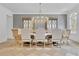 Elegant dining area with a large chandelier, stylish chairs, and exquisite furnishings at 126 Owens Mill Pl, Canton, GA 30115