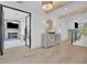 Inviting foyer featuring hardwood floors and a view into a cozy living room with a fireplace at 126 Owens Mill Pl, Canton, GA 30115