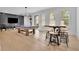 Spacious game room featuring a ping pong table, high-top seating, and modern lighting at 126 Owens Mill Pl, Canton, GA 30115