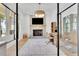 Home office features natural light, hardwood floors and a stone fireplace at 126 Owens Mill Pl, Canton, GA 30115
