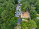 Aerial shot showcases the property's location surrounded by mature trees at 3100 Mount Gilead Sw Rd, Atlanta, GA 30311