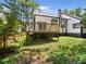 Elevated backyard deck offering serene views of the lawn and surroundings at 3100 Mount Gilead Sw Rd, Atlanta, GA 30311
