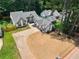 A front exterior view showcasing a lawn and the home's contrasting trim at 3100 Mount Gilead Sw Rd, Atlanta, GA 30311