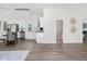 Bright open concept with updated kitchen, stainless appliances, dining area, and half bath at 3100 Mount Gilead Sw Rd, Atlanta, GA 30311