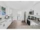 Bright kitchen features stainless appliances, granite countertops and hardwood floors at 3100 Mount Gilead Sw Rd, Atlanta, GA 30311