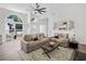 Comfortable living room with ample seating, fireplace, and large windows at 3100 Mount Gilead Sw Rd, Atlanta, GA 30311