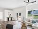 Open living room featuring white walls, bright natural light and stylish furnishings at 3100 Mount Gilead Sw Rd, Atlanta, GA 30311