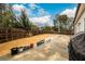 The backyard includes a cement patio and is surrounded by a wood fence at 3430 Summerpoint Xing, Cumming, GA 30028