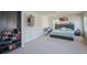 Spacious bedroom with ample storage and a large bed, bathed in natural light at 6827 Chataran Dr, Lithia Springs, GA 30122
