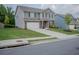 Charming two-story home with a spacious lawn and long drive way at 6827 Chataran Dr, Lithia Springs, GA 30122
