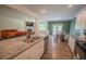 Open kitchen with granite counters, stainless appliances, and bar stool seating at 6827 Chataran Dr, Lithia Springs, GA 30122