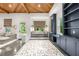 Stylish sitting area featuring a wood ceiling, custom built-ins, and a built-in bench seat at 803 Courtenay Ne Dr, Atlanta, GA 30306