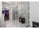 Modern glass-enclosed shower with tiled walls and floor, and convenient built-in bench at 113 Regent Pl, Woodstock, GA 30188
