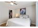 Well-lit bedroom with neutral tones and comfortable bedding for a serene atmosphere at 113 Regent Pl, Woodstock, GA 30188