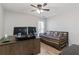 Dedicated office space with ample desk space and comfortable daybed for relaxation at 113 Regent Pl, Woodstock, GA 30188