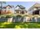 A flat backyard with terraced hardscape, an outdoor seating area, and lush landscaping at 1753 Russell Se St, Atlanta, GA 30316