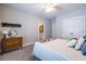 Light-filled bedroom with classic dresser and closet at 1753 Russell Se St, Atlanta, GA 30316