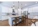 Stylish kitchen featuring a granite island, stainless steel appliances, and pendant lighting at 1753 Russell Se St, Atlanta, GA 30316