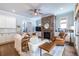 Spacious living room showing the staircase and fireplace, with open concept design at 1753 Russell Se St, Atlanta, GA 30316