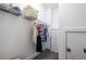 Walk-in closet with storage rack, shelving, and white dresser at 1753 Russell Se St, Atlanta, GA 30316