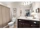 Clean bathroom with a shower, vanity, and ample lighting with neutral colors at 325 Ridge Hill Cir # 3, Marietta, GA 30064