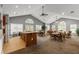 Spacious clubhouse featuring a large island, multiple seating areas, and vaulted ceilings with ceiling fans at 325 Ridge Hill Cir # 3, Marietta, GA 30064
