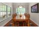 Bright dining room with large windows and a spacious wooden table for entertaining at 325 Ridge Hill Cir # 3, Marietta, GA 30064