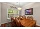 Cozy dining room with a decorative light fixture and a view of the backyard at 325 Ridge Hill Cir # 3, Marietta, GA 30064