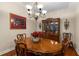 Traditional dining room featuring hardwood floors, neutral paint, chandelier, and ample space for entertaining at 325 Ridge Hill Cir # 3, Marietta, GA 30064