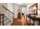 Elegant foyer with hardwood floors, staircase, and console table creating a welcoming entrance at 325 Ridge Hill Cir # 3, Marietta, GA 30064