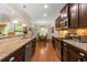 Spacious kitchen features granite countertops, stainless steel appliances, and hardwood flooring at 325 Ridge Hill Cir # 3, Marietta, GA 30064