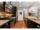 Modern kitchen with stainless steel appliances, granite counters, and ample cabinet space at 325 Ridge Hill Cir # 3, Marietta, GA 30064