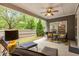 Covered outdoor patio with comfortable seating and view of the backyard at 325 Ridge Hill Cir # 3, Marietta, GA 30064