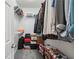 Walk-in closet with shelving, hanging racks and room for shoes at 4440 Weston Sw Dr, Lilburn, GA 30047