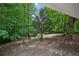 Exterior shot from porch with wooded backyard at 6201 Davids Se Way, Acworth, GA 30102