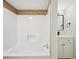Bathroom with a combined shower and tub with ceramic tile, a vanity, and a black faucet at 6201 Davids Se Way, Acworth, GA 30102