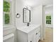 Bright bathroom with modern black fixtures and great natural light at 6201 Davids Se Way, Acworth, GA 30102