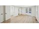 Bright bedroom features a closet, French doors and modern vinyl plank flooring at 6201 Davids Se Way, Acworth, GA 30102