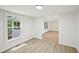 Sunlit room with windows and light colored floors with view to an outdoor living area at 6201 Davids Se Way, Acworth, GA 30102